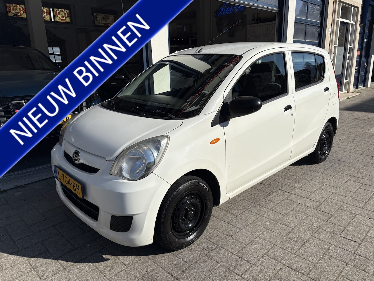 Daihatsu Cuore - 1.0 Trend NIEUWE APK 4/2027 - AutoWereld.nl