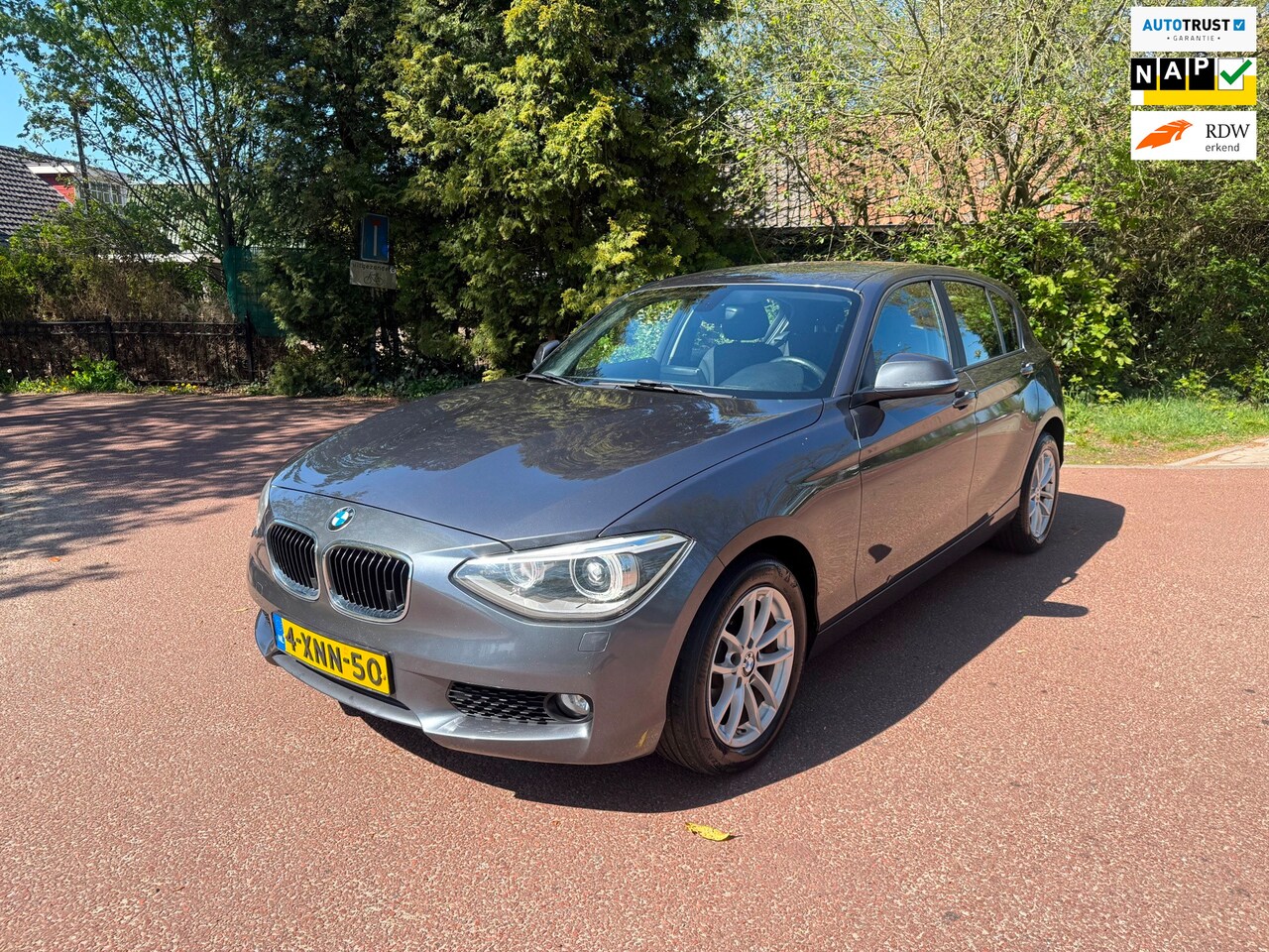 BMW 1-serie - 116i Executive / Navi / Airco / NAP / led / PDC / Apk / Aux - AutoWereld.nl