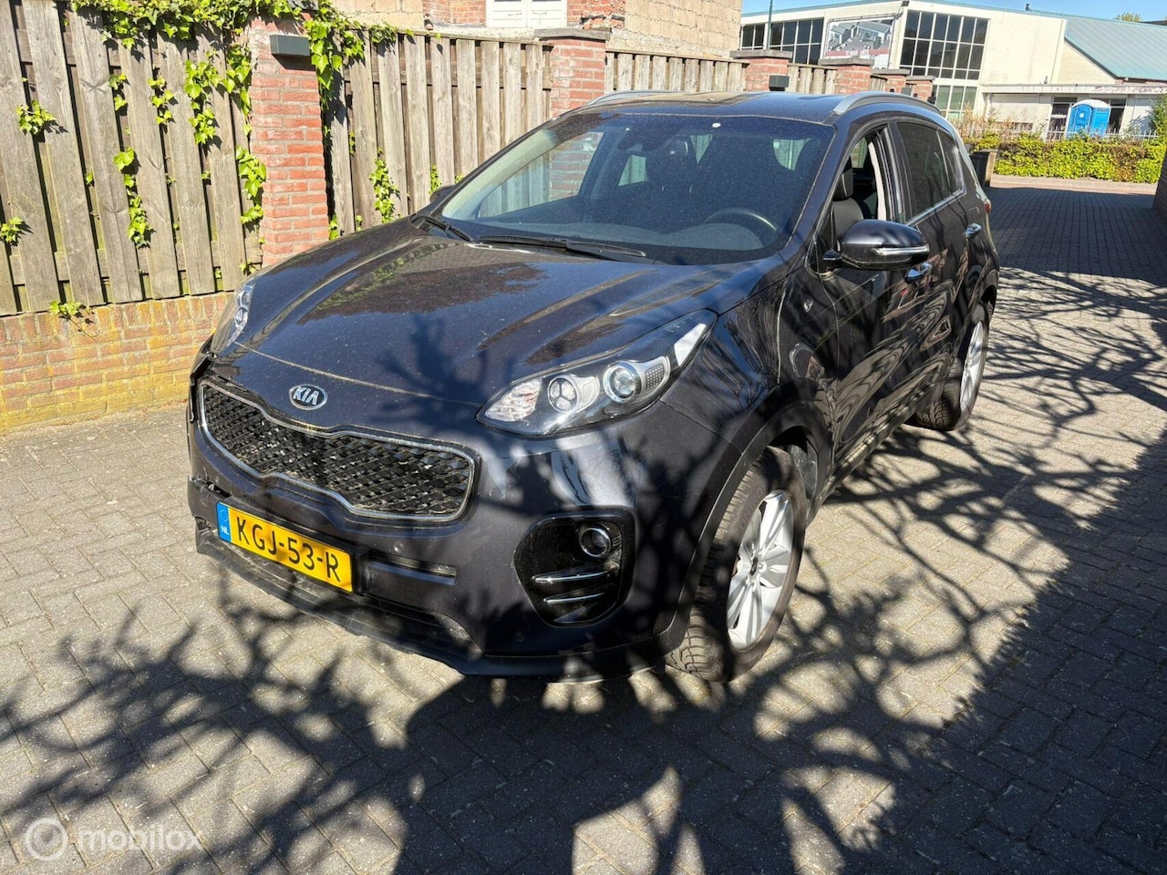 Kia Sportage - 1.6 met lichte voorschade - AutoWereld.nl
