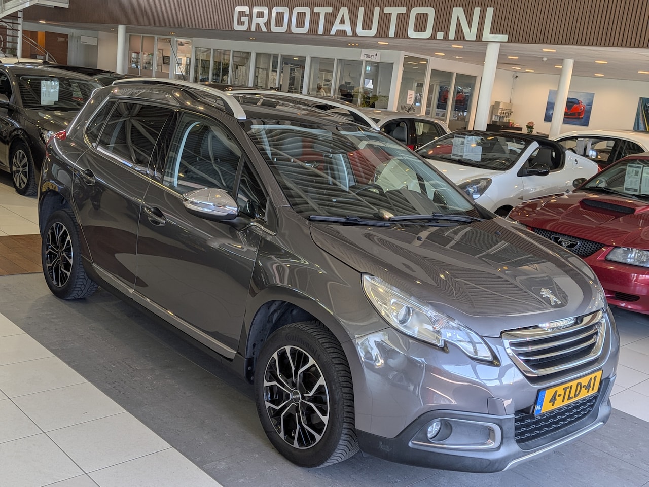 Peugeot 2008 - 1.2 VTi Allure Pack Premium Plus Automaat Panoramadak, Airco, Cruise Control, Stuurbekrach - AutoWereld.nl