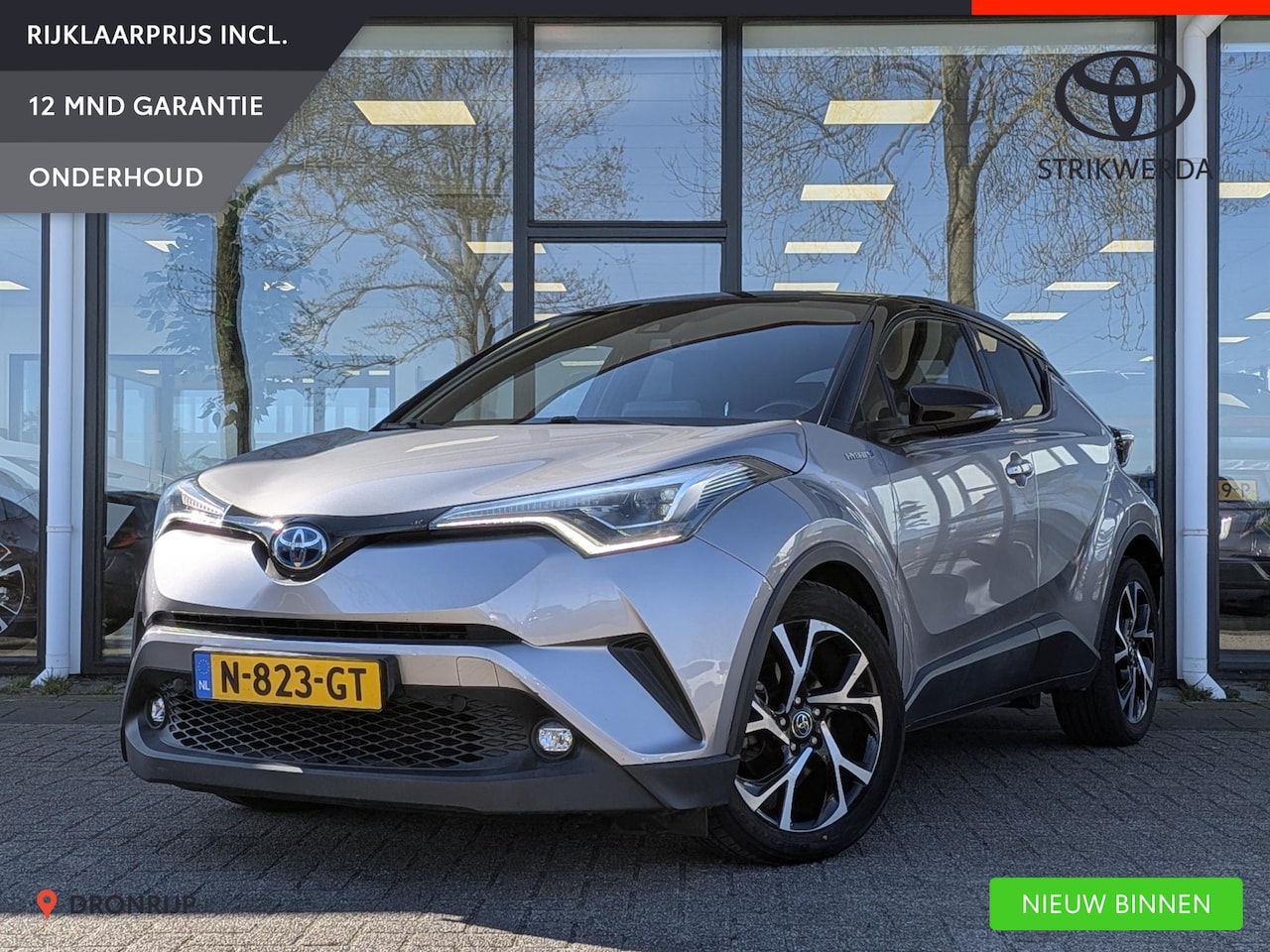Toyota C-HR - 1.8 Hybrid Bi-Tone | Stoelverw. | Dodehoek | Camera | ACC | Keyless | LED-pakket - AutoWereld.nl