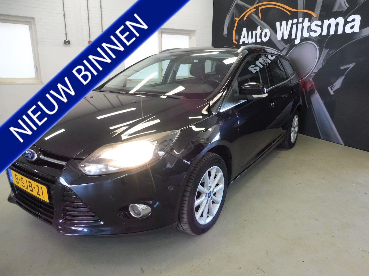 Ford Focus Wagon - 1.6 TDCI ECOnetic Lease Titanium Navi | Cruise | LMV | PDC v+a | Boekjes - AutoWereld.nl