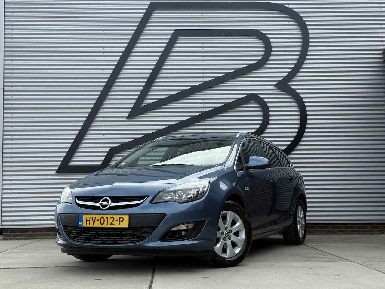Opel Astra Sports Tourer - 1.4 Turbo Blitz 1e Eigenaar|Navi|Airco|Cruise|Trekhaak|PDC|Dealer Onderhouden|N.A.P|APK to - AutoWereld.nl