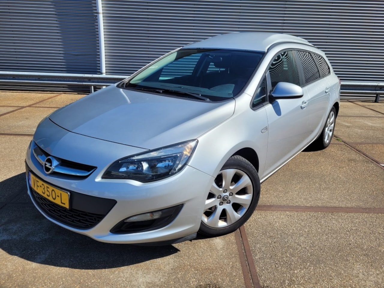 Opel Astra Sports Tourer - 1.3 CDTi Edition Grijs kent - AutoWereld.nl
