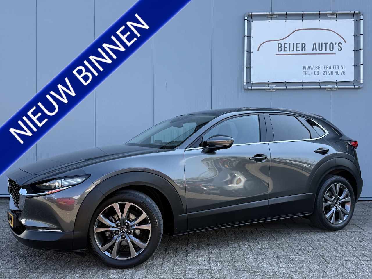 Mazda CX-30 - 2.0 e-SkyActiv-X M Hybrid Luxury Trekhaak/Head-up/Apple Carplay. - AutoWereld.nl
