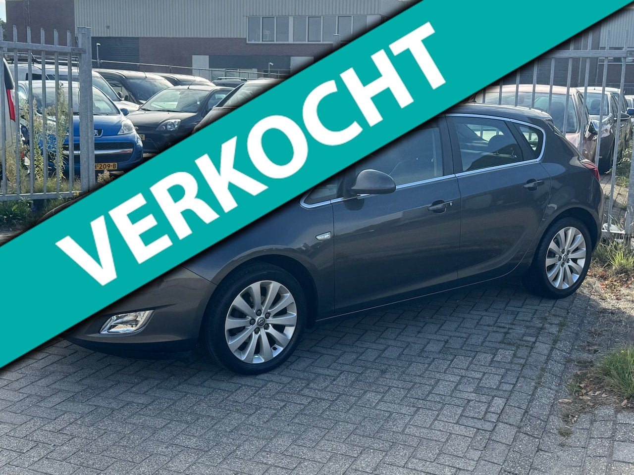 Opel Astra - 1.4 Turbo Cosmo 120PK! NL AUTO NAP 2e EIGENAAR! CRUISE l TREKHAAK l LEER l AIRCO l PDC! DE - AutoWereld.nl