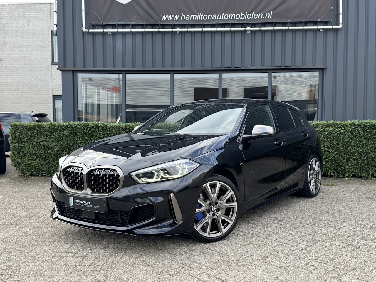 BMW 1-serie - M135i 306pk xDrive High Executive M Sportpakket Eventuri Milltek 92dkm!! - AutoWereld.nl
