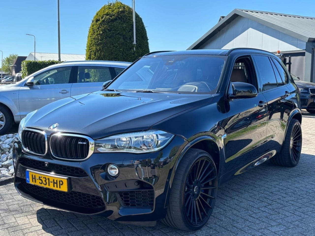 BMW X5M - 4.4 V8 575PK 2015 Head up Trekhaak 22'' Haxer Concave - AutoWereld.nl