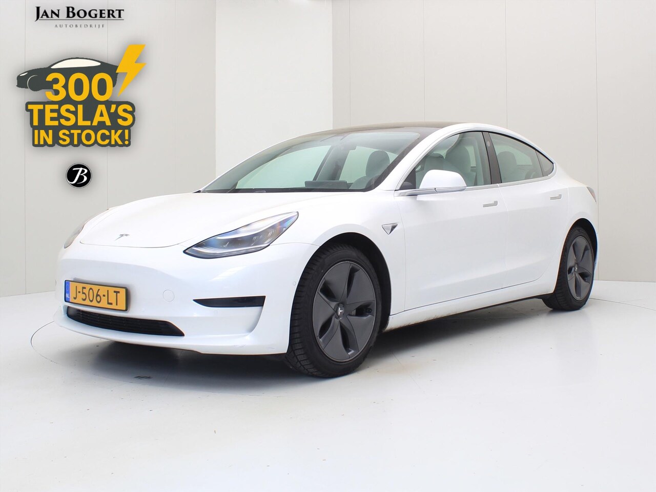 Tesla Model 3 - Standard RWD Plus 85% SoH [ WIT LEDER+AUTOPILOT+60 kWh+PREMIUM AUDIO ] - AutoWereld.nl