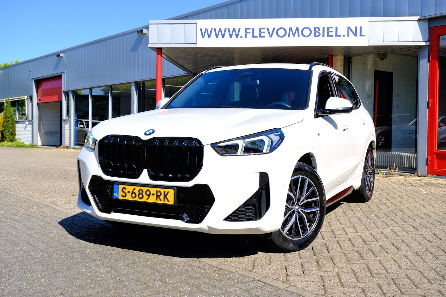 BMW X1 - SDrive18i M Sport Aut. Leder|CarPlay|1e Eig|Sportstoelen|LMV|Cam - AutoWereld.nl