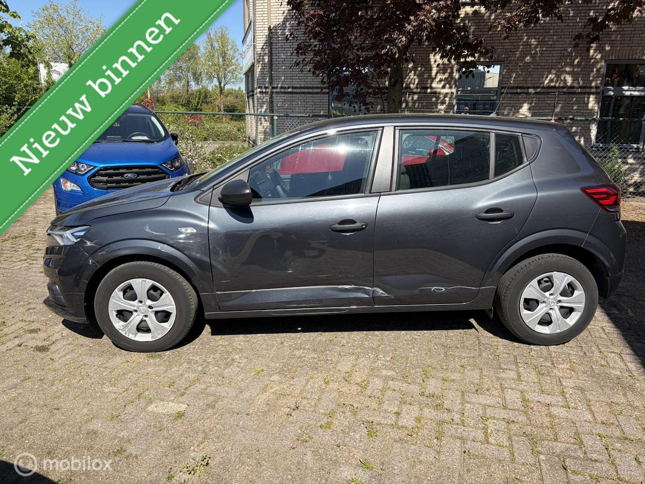 Dacia Sandero - 1.0 Comfort Nice Damage 11.968 KM 1e eigenaar - AutoWereld.nl