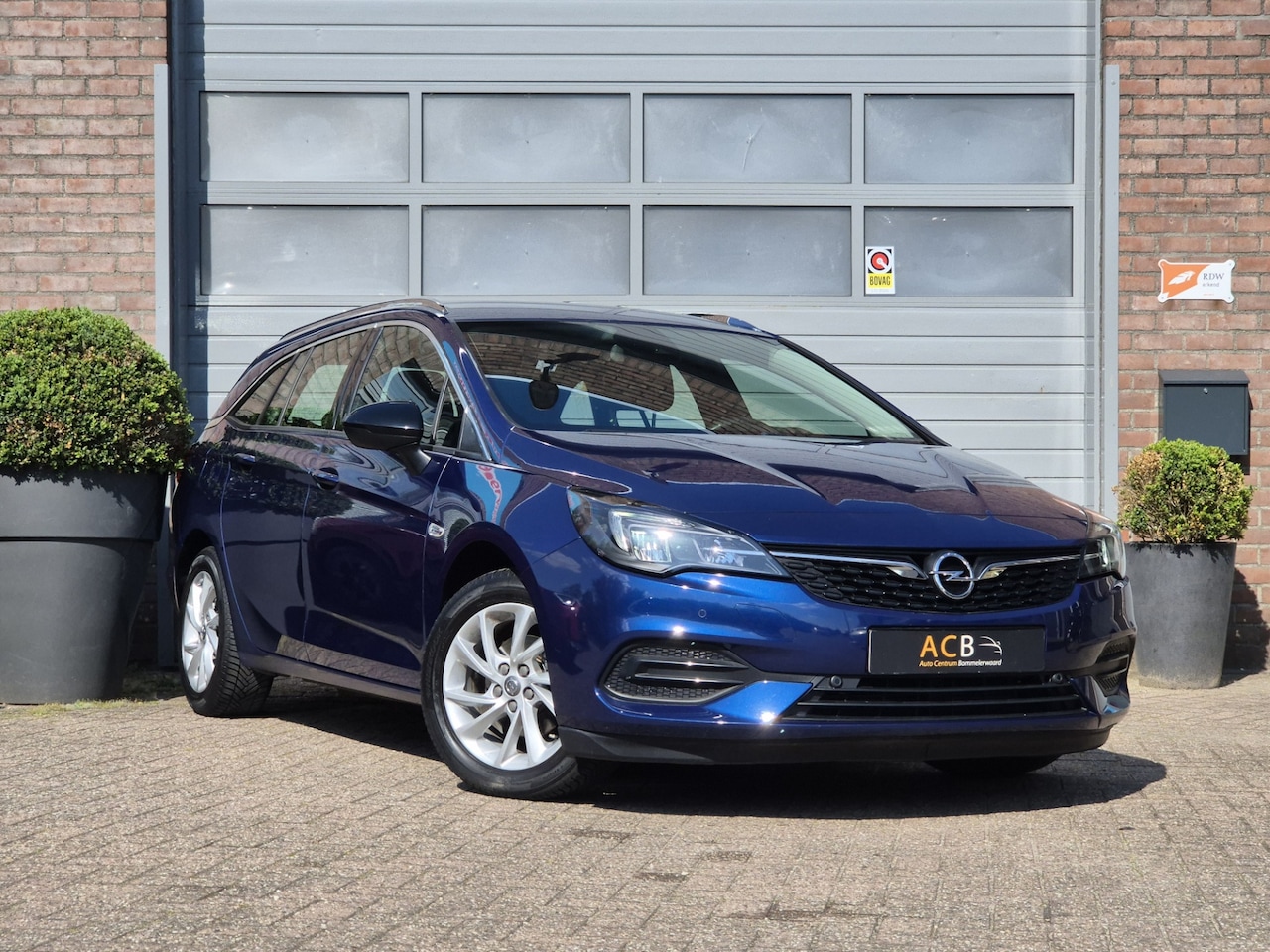 Opel Astra Sports Tourer - 1.2 Business Elegance Dealer onderhouden! - AutoWereld.nl