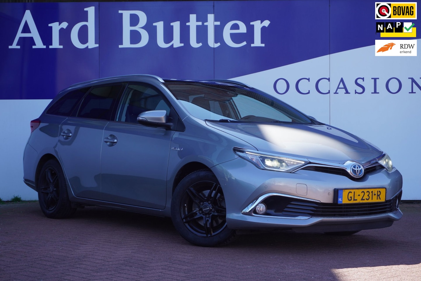 Toyota Auris Touring Sports - 1.8 Hybrid Lease pro+Pano-dak+Half-Leder+stoel-verw+led+navigatie+camera = TOP - AutoWereld.nl