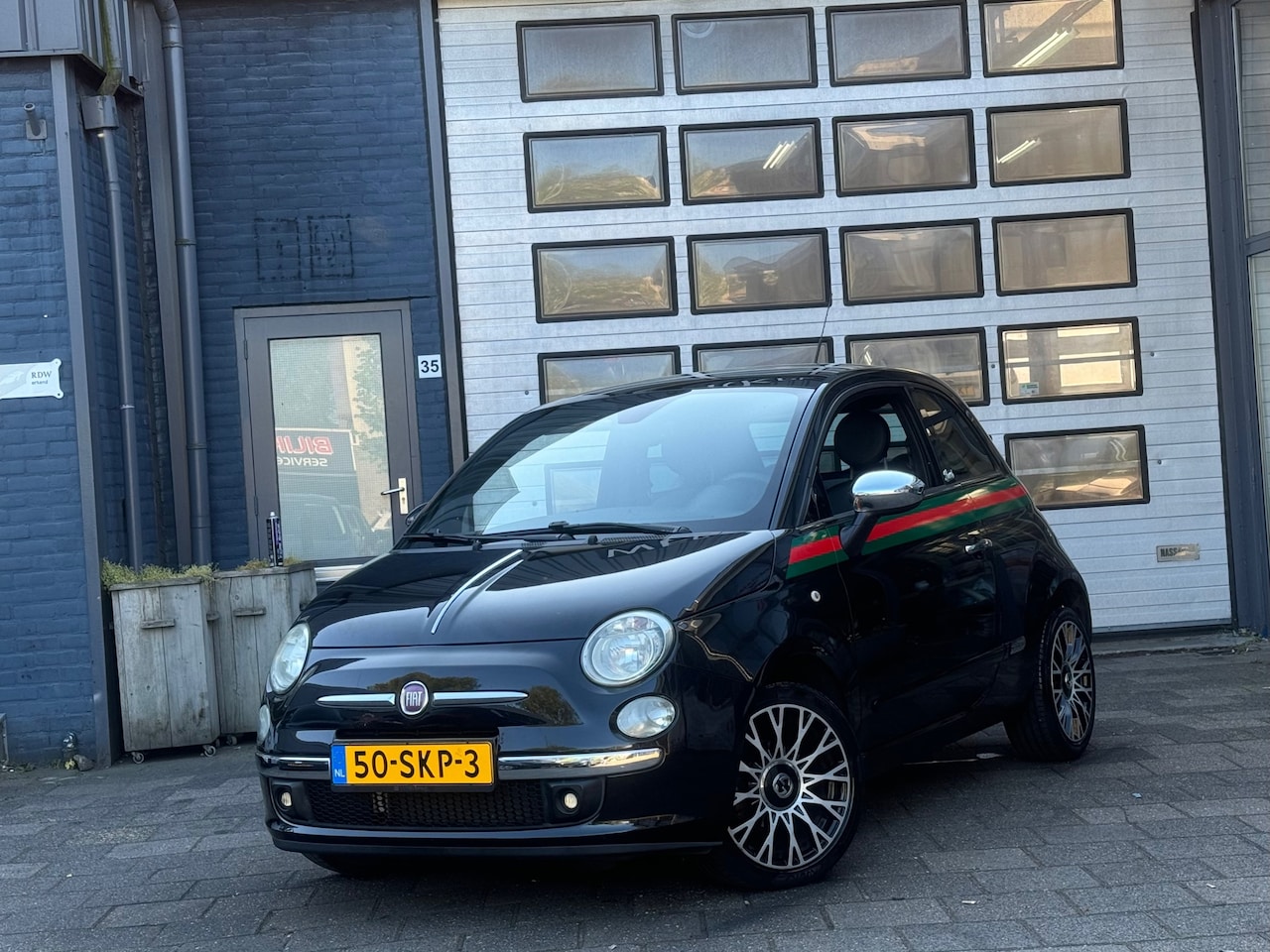 Fiat 500 - 1.2 Lounge By Gucci | Clima | Pano | PDC - AutoWereld.nl