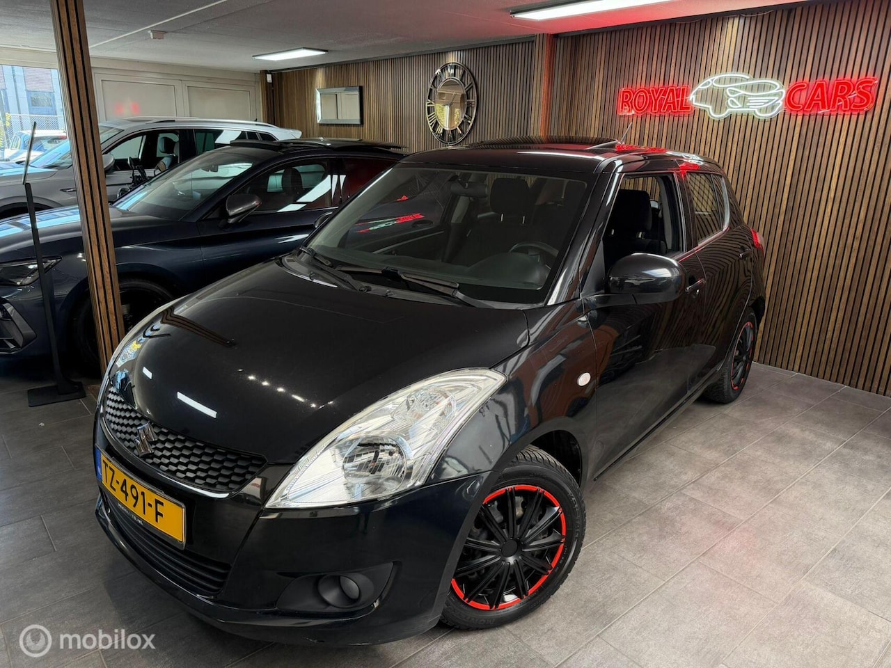 Suzuki Swift - 1.2 Exclusive/ Schuifdak/ Cruise C. / Keyless - AutoWereld.nl
