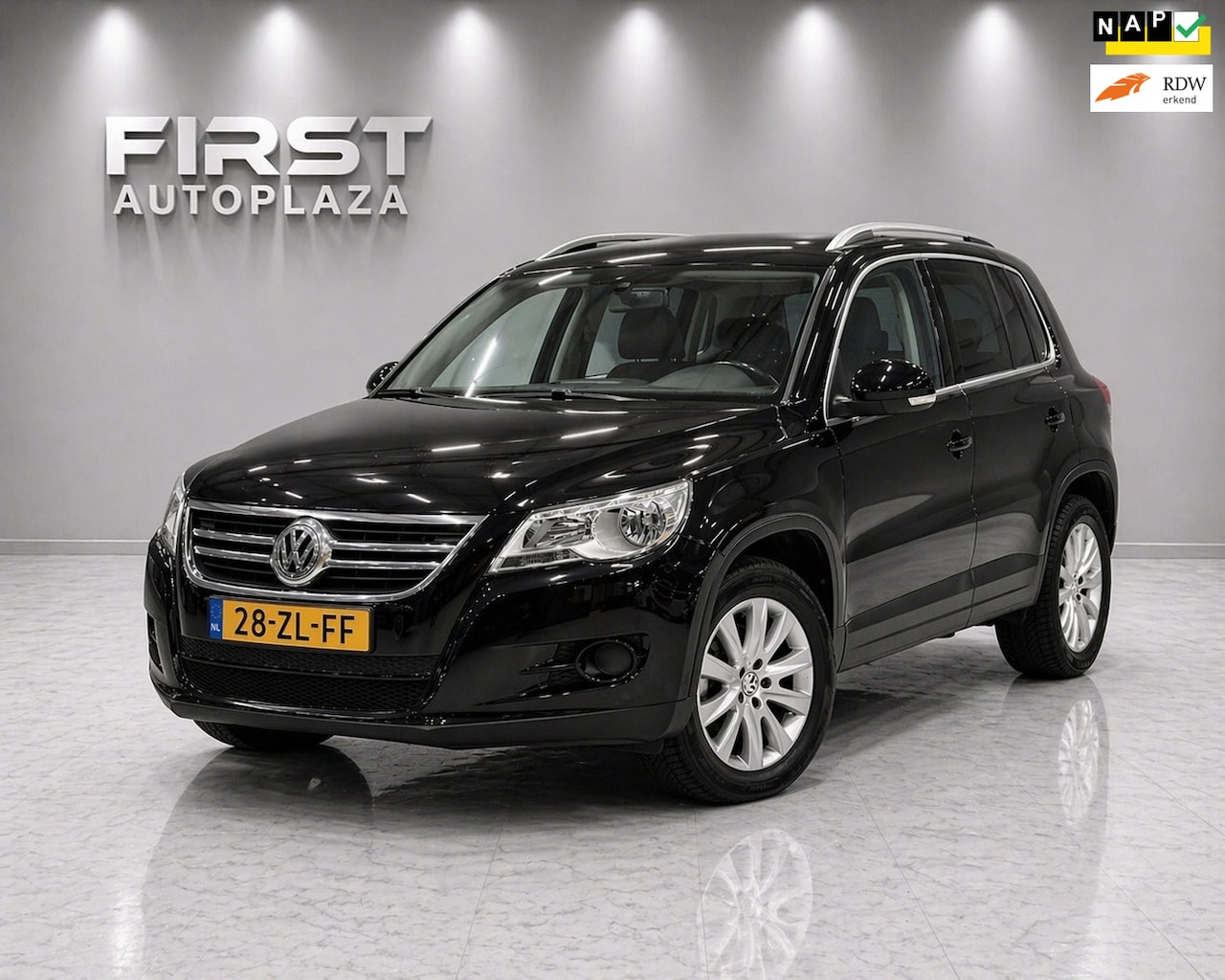 Volkswagen Tiguan - 1.4 TSI Sport&Style 4Motion CRUISE/6-BAK/AIRCO | NETTE AUTO ! - AutoWereld.nl