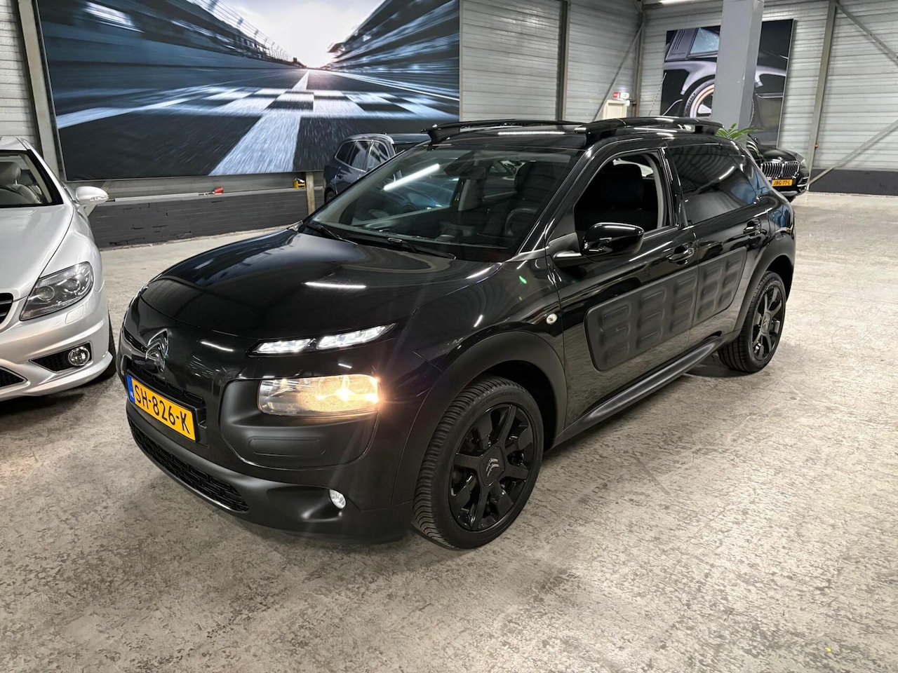 Citroën C4 Cactus - 1.2 PT Business Plus|Clima|Cruise|D-riem vv - AutoWereld.nl
