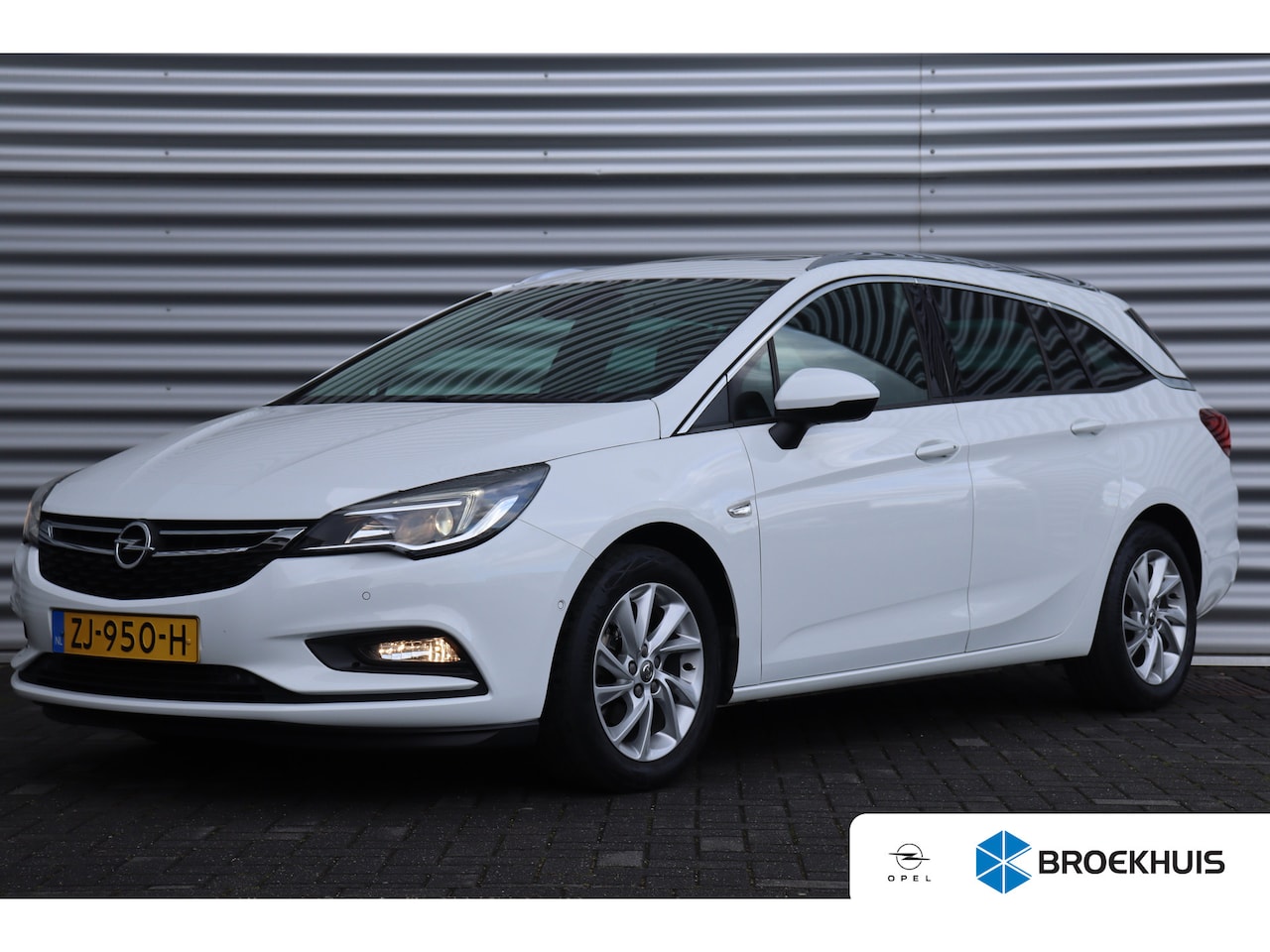 Opel Astra Sports Tourer - 1.4 TURBO 150PK INNOVATION+ / NAVI / LEDER / CLIMA / LED / PDC / AGR / 16" LMV / KEYLESS / - AutoWereld.nl