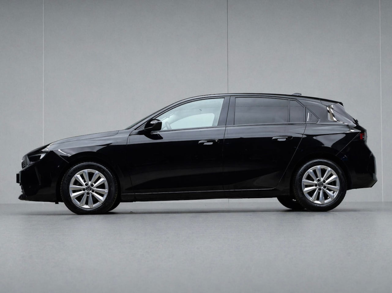 Opel Astra - 1.2 Business Edition Sport (APPLE CARPLAY,NAVI,CAMERA,PDC,STOELVERWARMING,CLIMATE,CRUISE,G - AutoWereld.nl