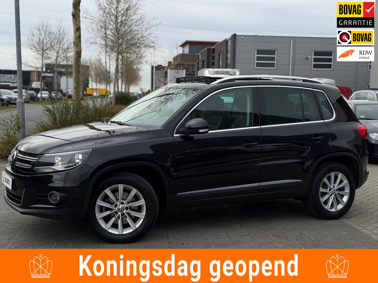 Volkswagen Tiguan - 2.0 TSI Sport&Style 4Motion | Automaat | Airco | NAP | Pano - AutoWereld.nl