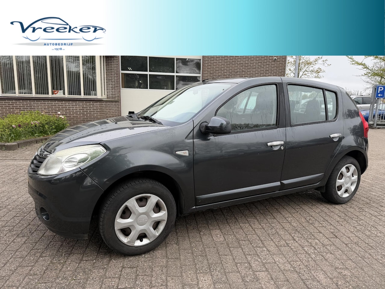 Dacia Sandero - 1.2 Lauréate Airco l nieuwe apk - AutoWereld.nl
