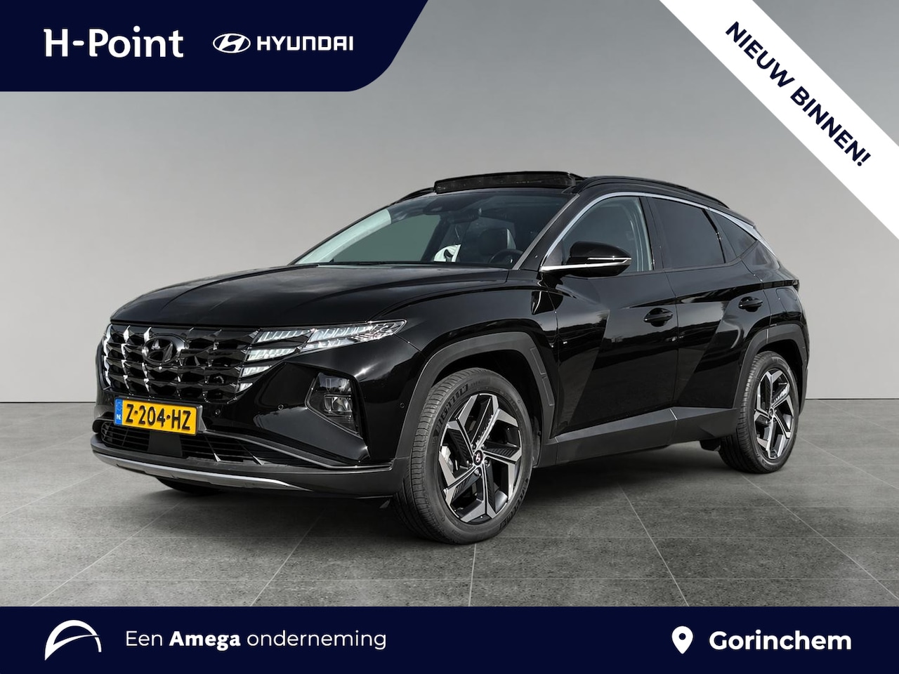 Hyundai Tucson - 1.6 T-GDI 265pk PHEV Premium Sky 4WD | SCHUIF/KANTELDAK | 19'' LM-VELGEN | NAVI | CRUISE C - AutoWereld.nl