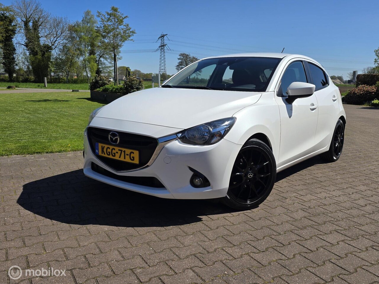 Mazda 2 - 1.5 Skyactiv-G 90/NAVI/CRUISE/PDC/17 INCH - AutoWereld.nl