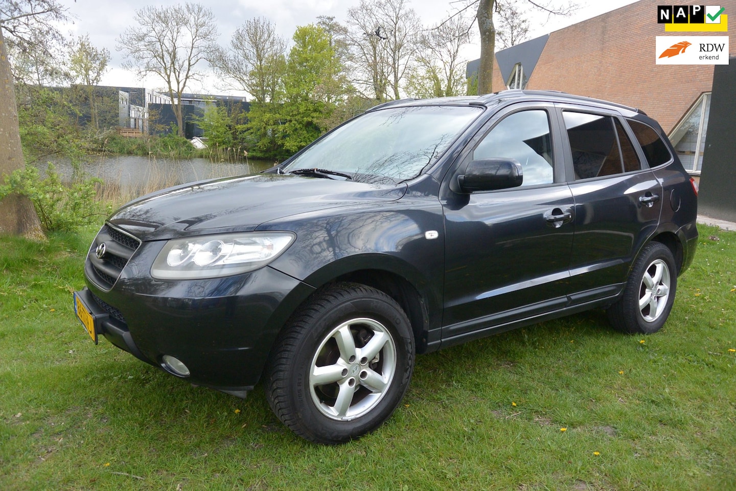 Hyundai Santa Fe - 2.7i V6 Dynamic 7persoons/airco/camera/cruise/nette auto - AutoWereld.nl