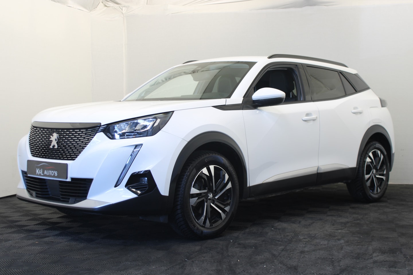 Peugeot 2008 - 1.2 PureTech Allure |Navi|Camera| - AutoWereld.nl