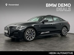 BMW i4 - eDrive40 M Sport Edition 84 kWh | Trekhaak | Comfort Access | Schuifdak | Camera | Hi-Fi |