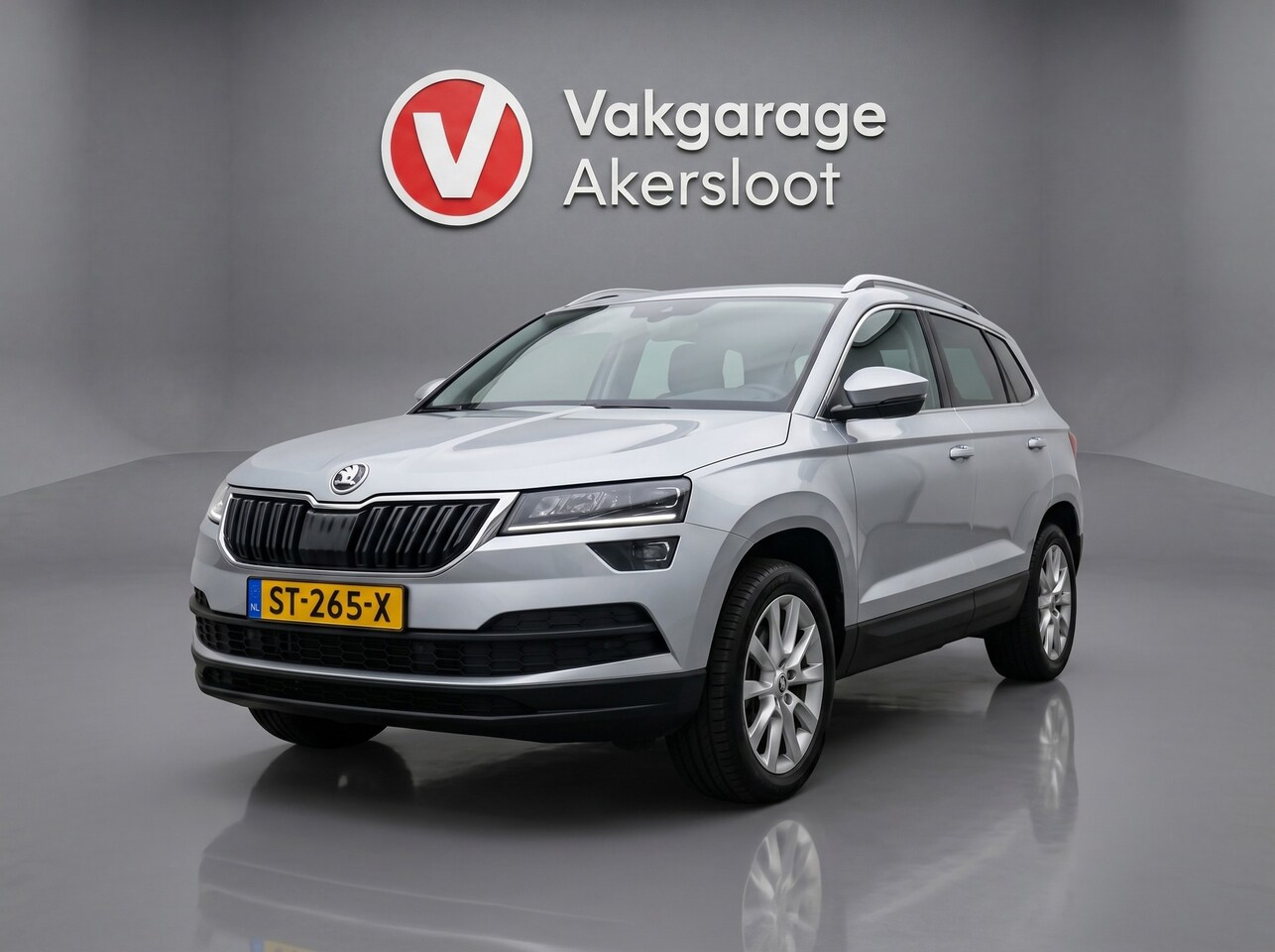Skoda Karoq - 1.0 TSI Style Business / Camera / Parkeersensoren / Navi / Bluetooth / Stoelverwarming - AutoWereld.nl