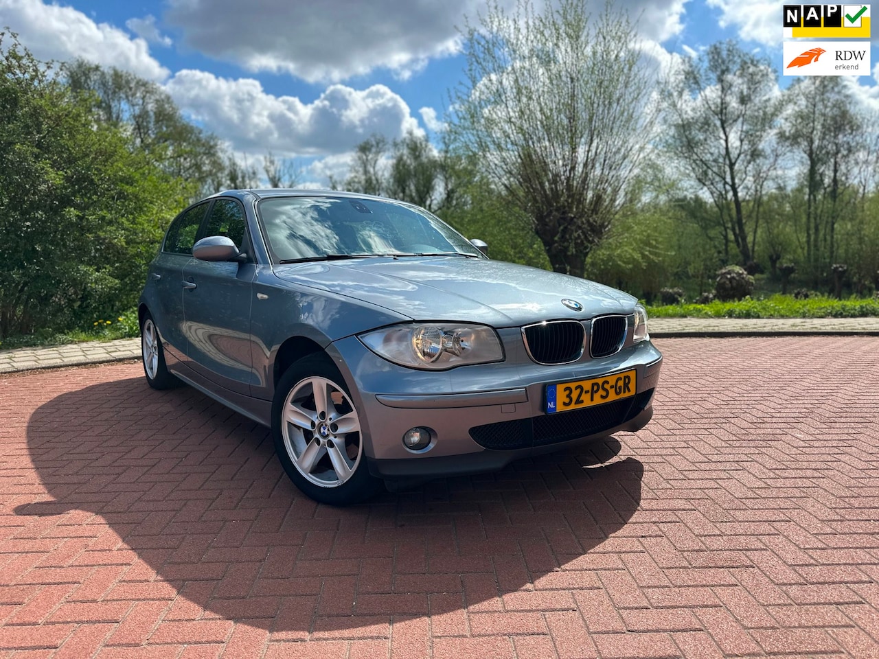 BMW 1-serie - 116i High Executive Airco/Nap - AutoWereld.nl