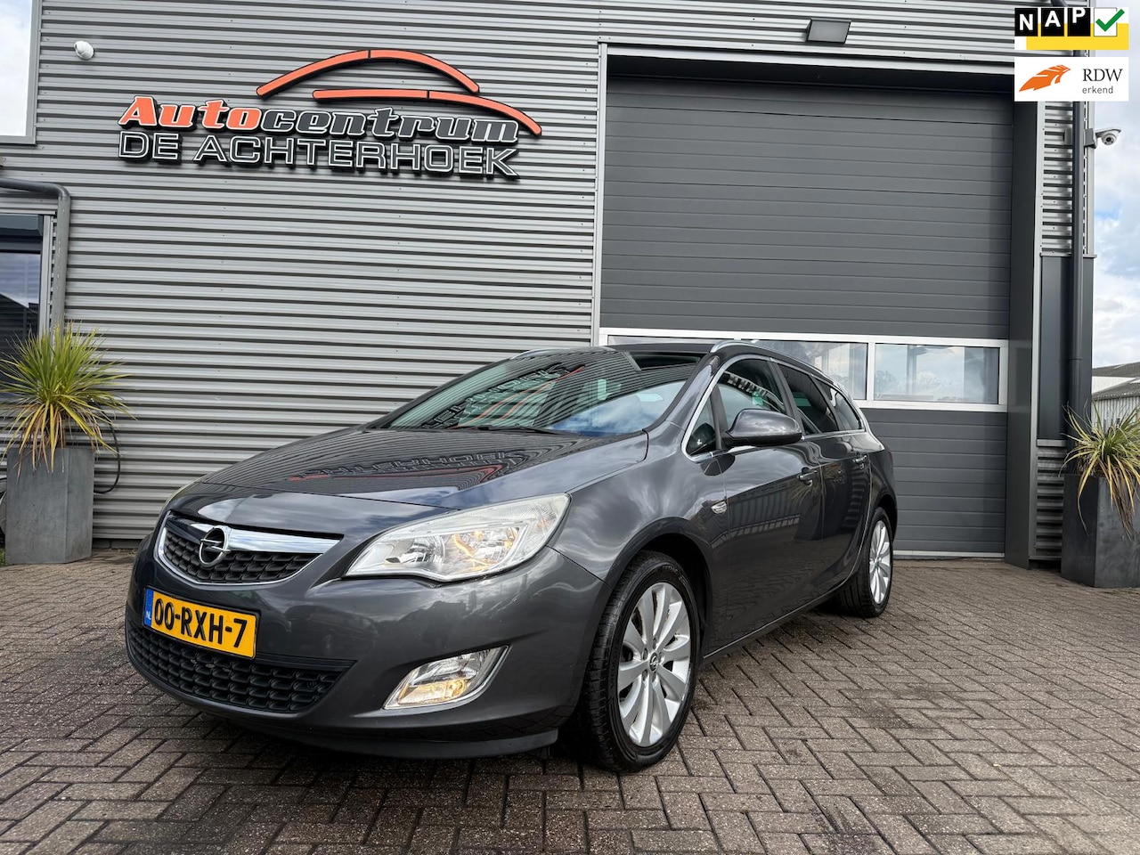 Opel Astra Sports Tourer - 1.4 Turbo Cosmo Navi | Station | Airco - AutoWereld.nl