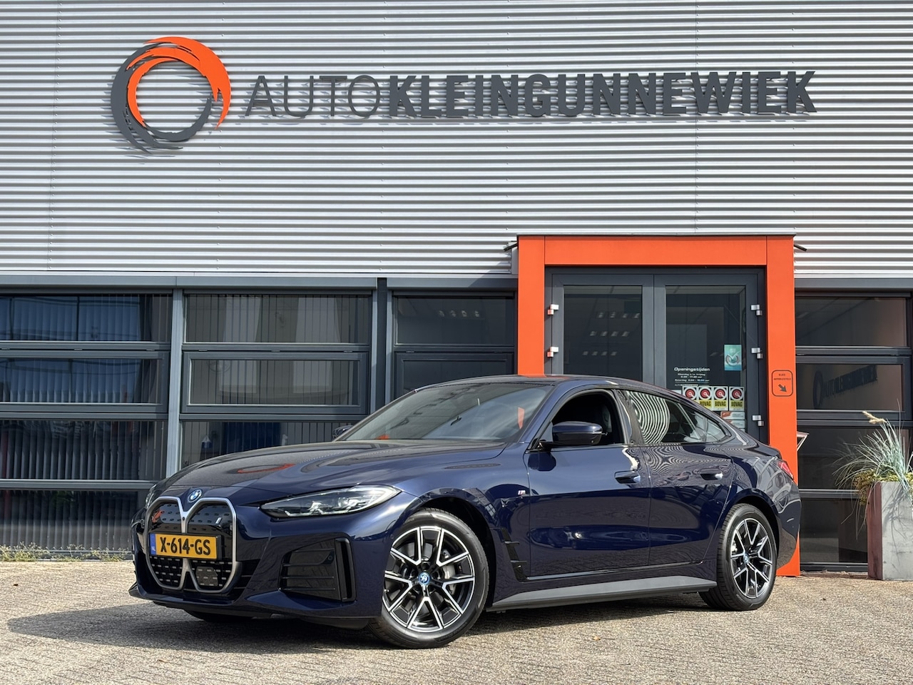 BMW i4 - eDrive40 High Executive 84 kWh / NL Auto / 360 Camera / Stoelverwarming / - AutoWereld.nl