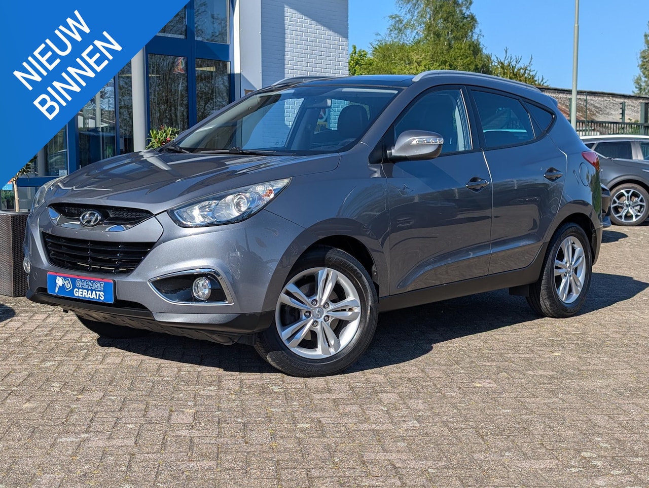 Hyundai ix35 - 1.6i GDI Style | Panodak, Leer, Keyless, Parkeersensoren, Climate Control, Stoelverwarming - AutoWereld.nl