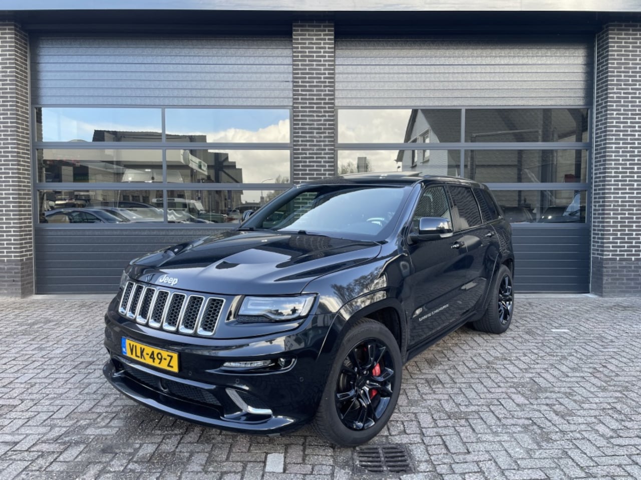 Jeep Grand Cherokee - 6.4 V8 SRT8 6.4 V8 SRT8 - AutoWereld.nl