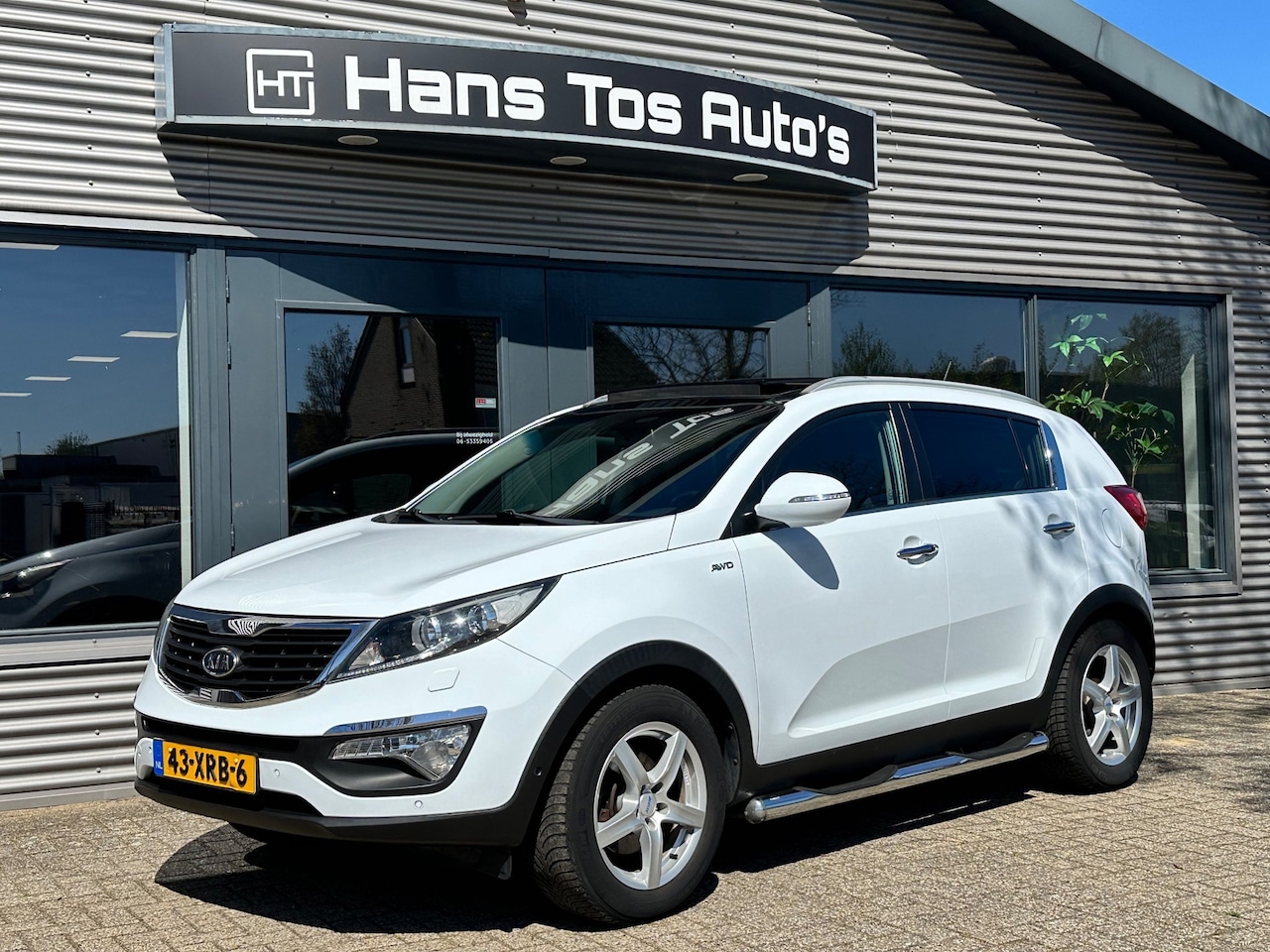 Kia Sportage - 2.0 Super Pack AWD AUTOMAAT Panorama / Leer / Camera / Xenon - AutoWereld.nl