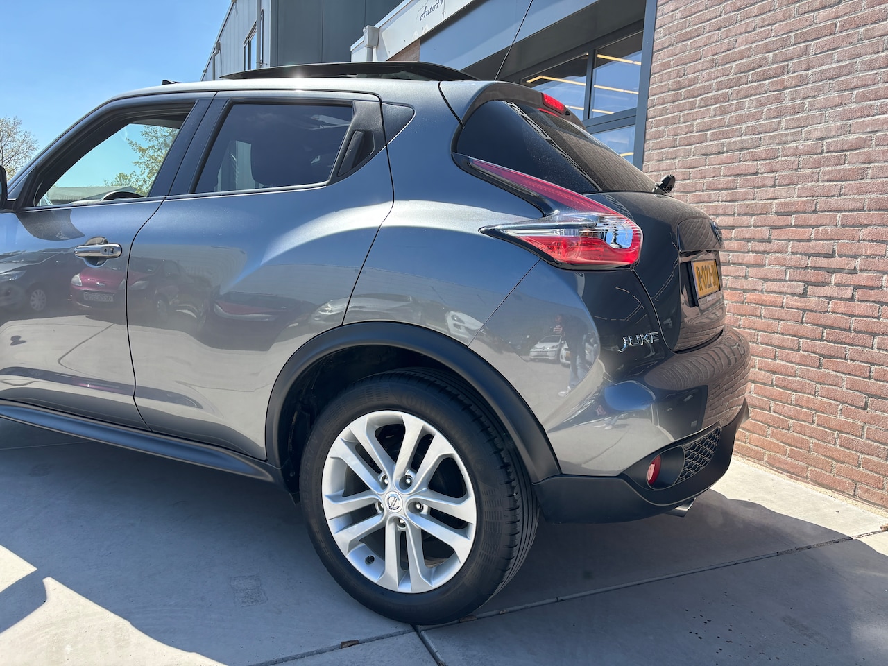 Nissan Juke - 1.2 DIG-T S/S Dynamic Edition | Panorama. Lage km’s. Navi. Camera. Onderhouden.