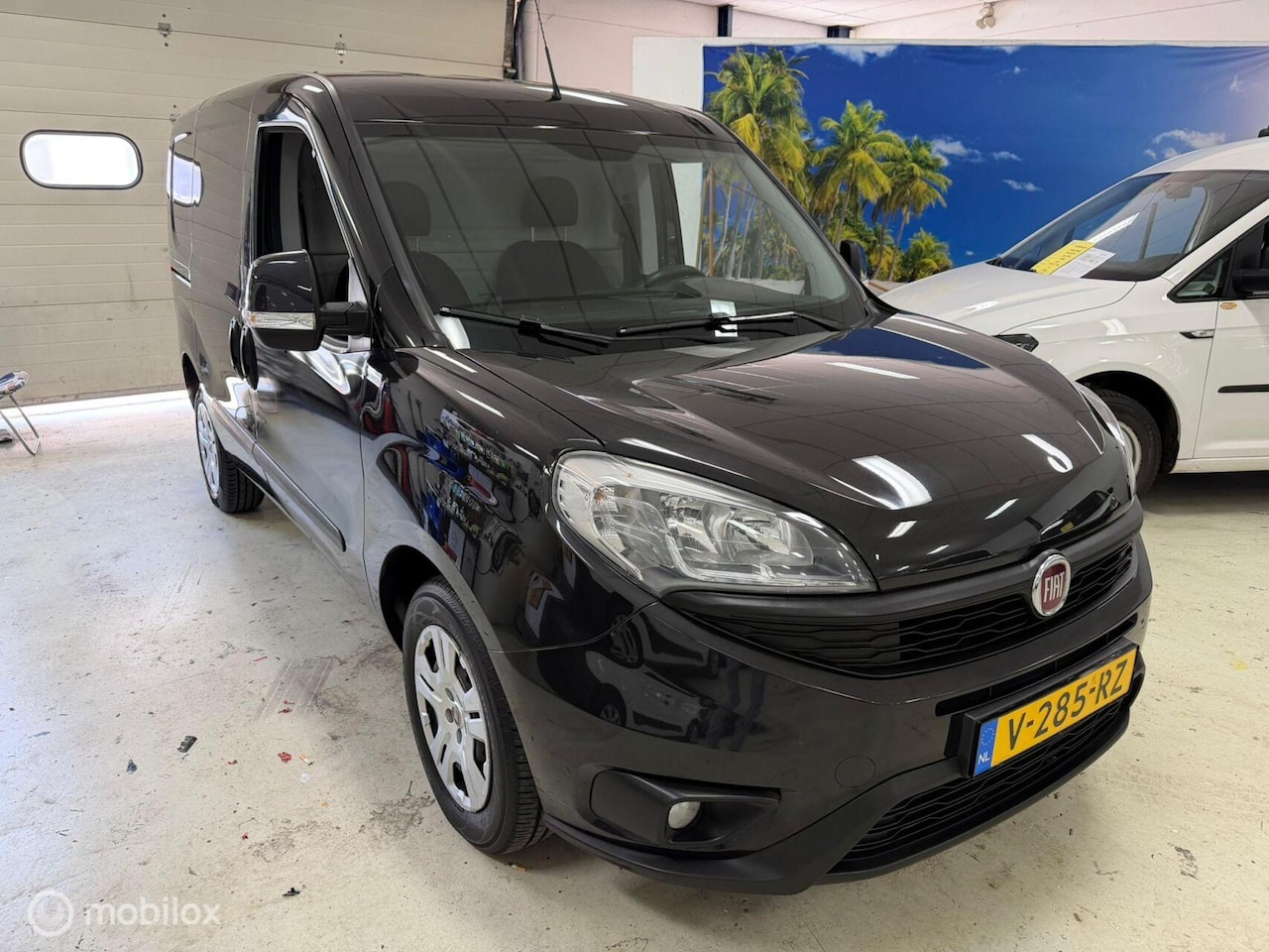 Fiat Doblò Cargo - 1.3 MJ L1 Airco Cruise Navi - AutoWereld.nl