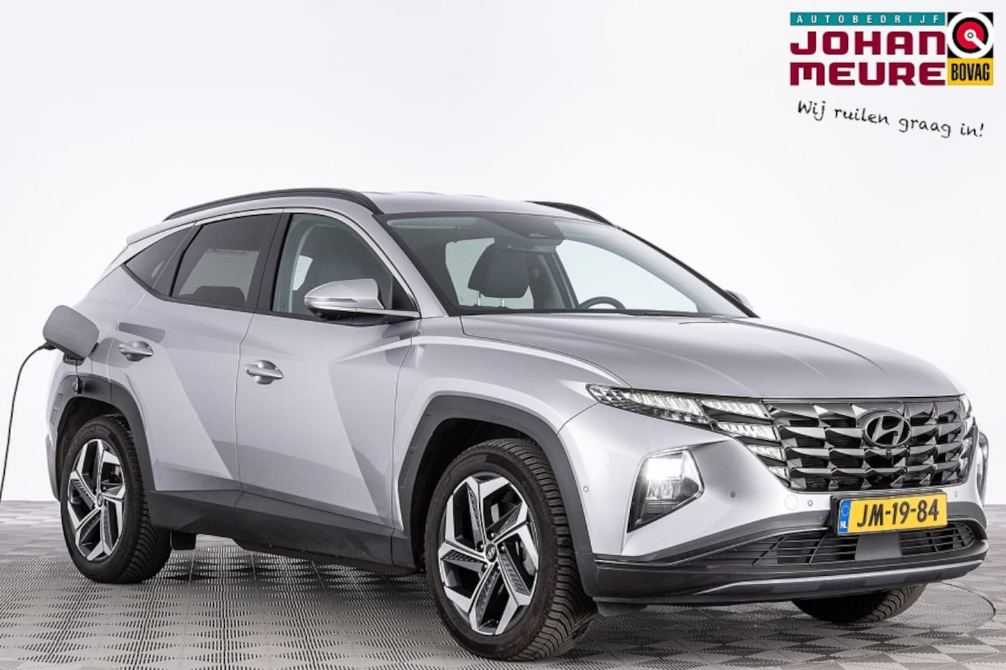 Hyundai Tucson - 1.6 T-GDI PHEV 4WD Premium | LEDER | Full LED | EL. STOEL | NAVI | ECC | VELGEN . - AutoWereld.nl