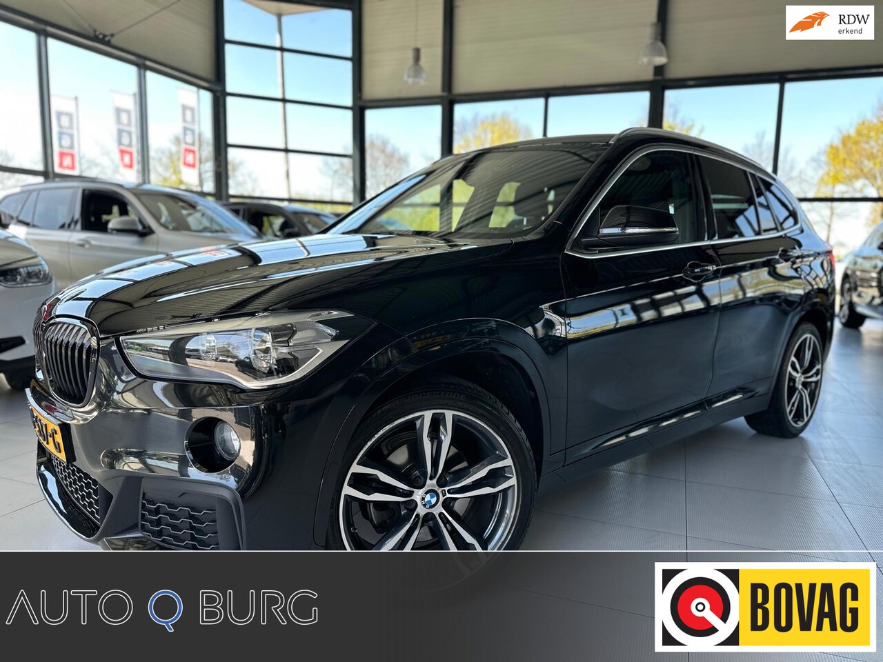 BMW X1 - SDrive18i M Pakket | afneembare Trekhaak | Navi | PDc | Climate | volledig Dealer onderhou - AutoWereld.nl