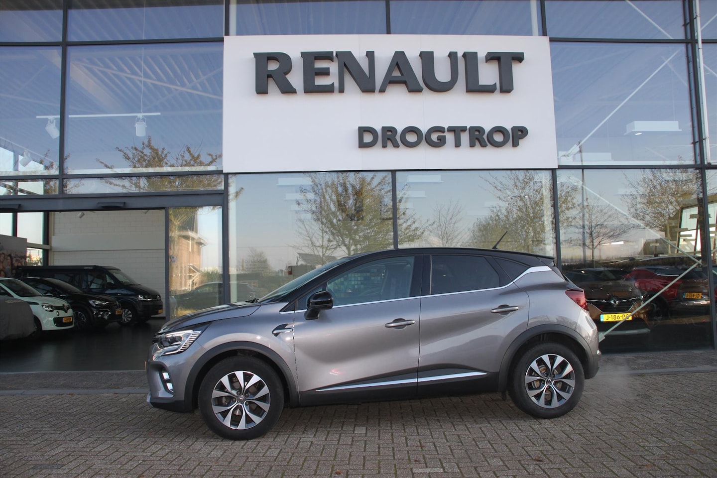 Renault Captur - 130PK-INTENS-AUTOM-62DKM-NAVI-CLIMA-PDC-LMV- - AutoWereld.nl