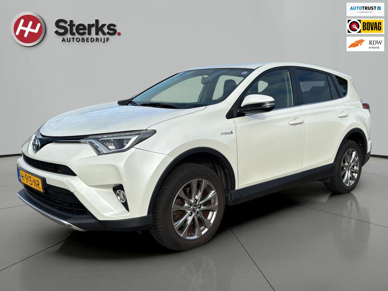 Toyota RAV4 - 2.5 Hybrid AWD Style TREKHAAK PARELMOER WIT 4 WD DRIVE - AutoWereld.nl