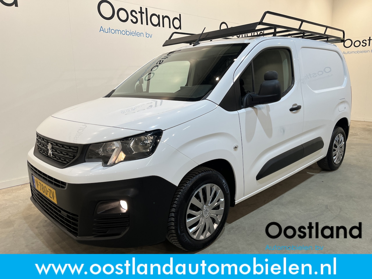 Peugeot Partner - 1.6 BlueHDI Premium / Euro 6 / Airco / Cruise Control / Trekhaak / Imperiaal / CarPlay - AutoWereld.nl