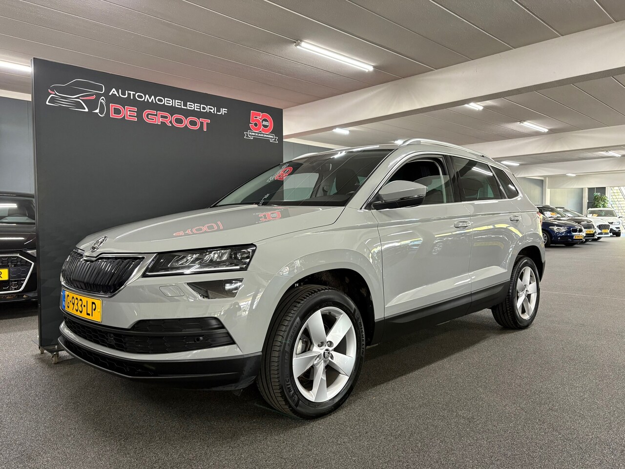 Skoda Karoq - 1.5 TSI ACT Business Edition/ NL auto/ Achteruitrijcamera/ Parkeersensoren voor en achter - AutoWereld.nl