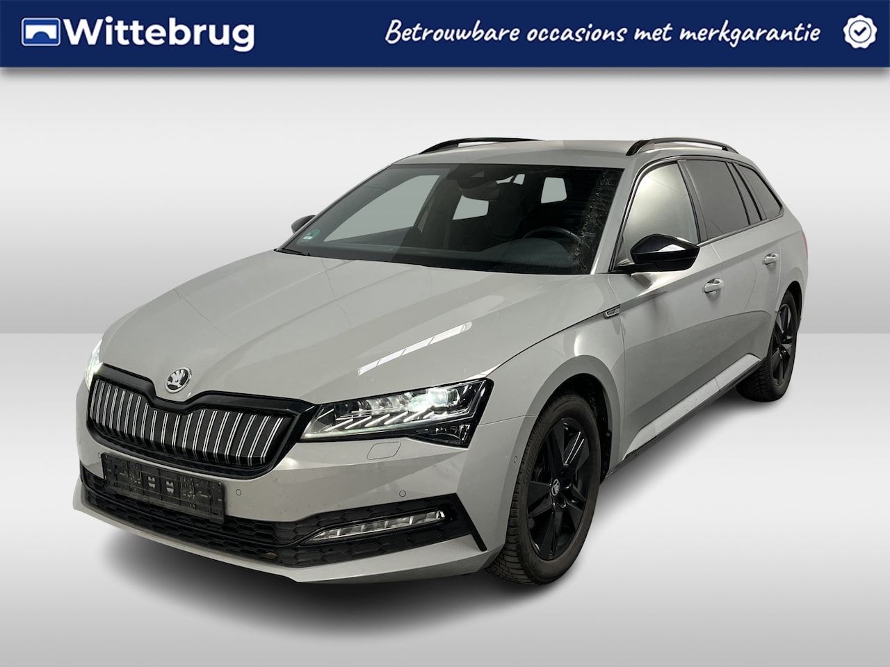 Skoda Superb Combi - 1.4 TSI iV Sportline / AUTOMAAT/ DCC/ TREKHAAK/ STUUR+STOELVERWARM./ MEMORY SEAT/ DODEHOEK - AutoWereld.nl