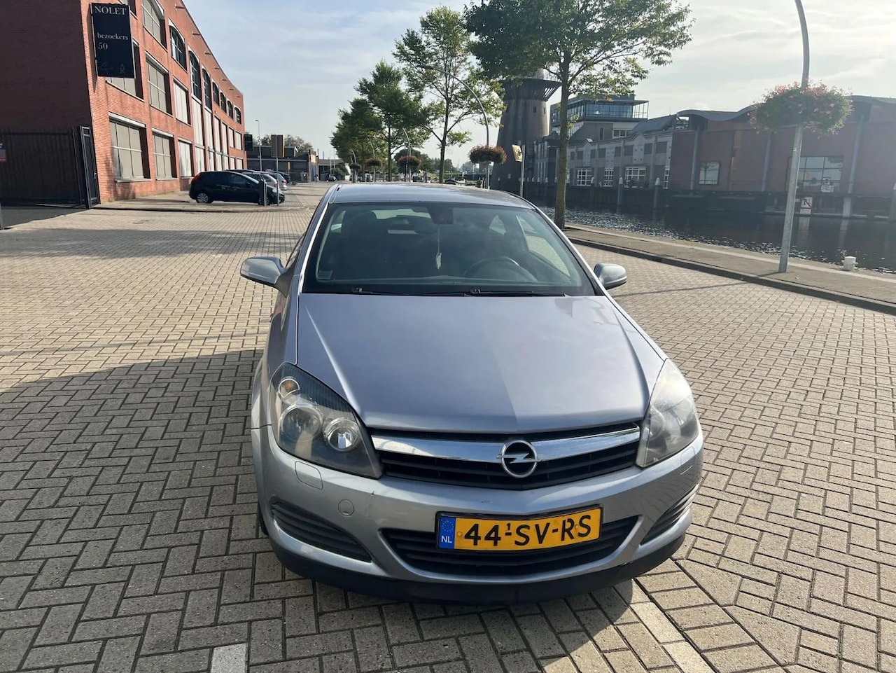 Opel Astra GTC - 1.9 CDTi Cosmo - AutoWereld.nl