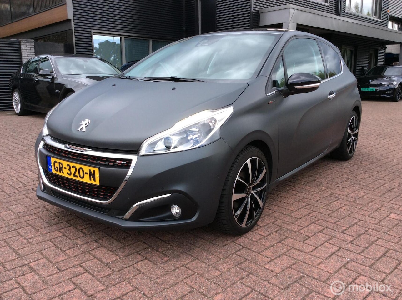 Peugeot 208 - 1.2 PureTech GT-line Panorama Org Mat Grijs Nap 17" - AutoWereld.nl