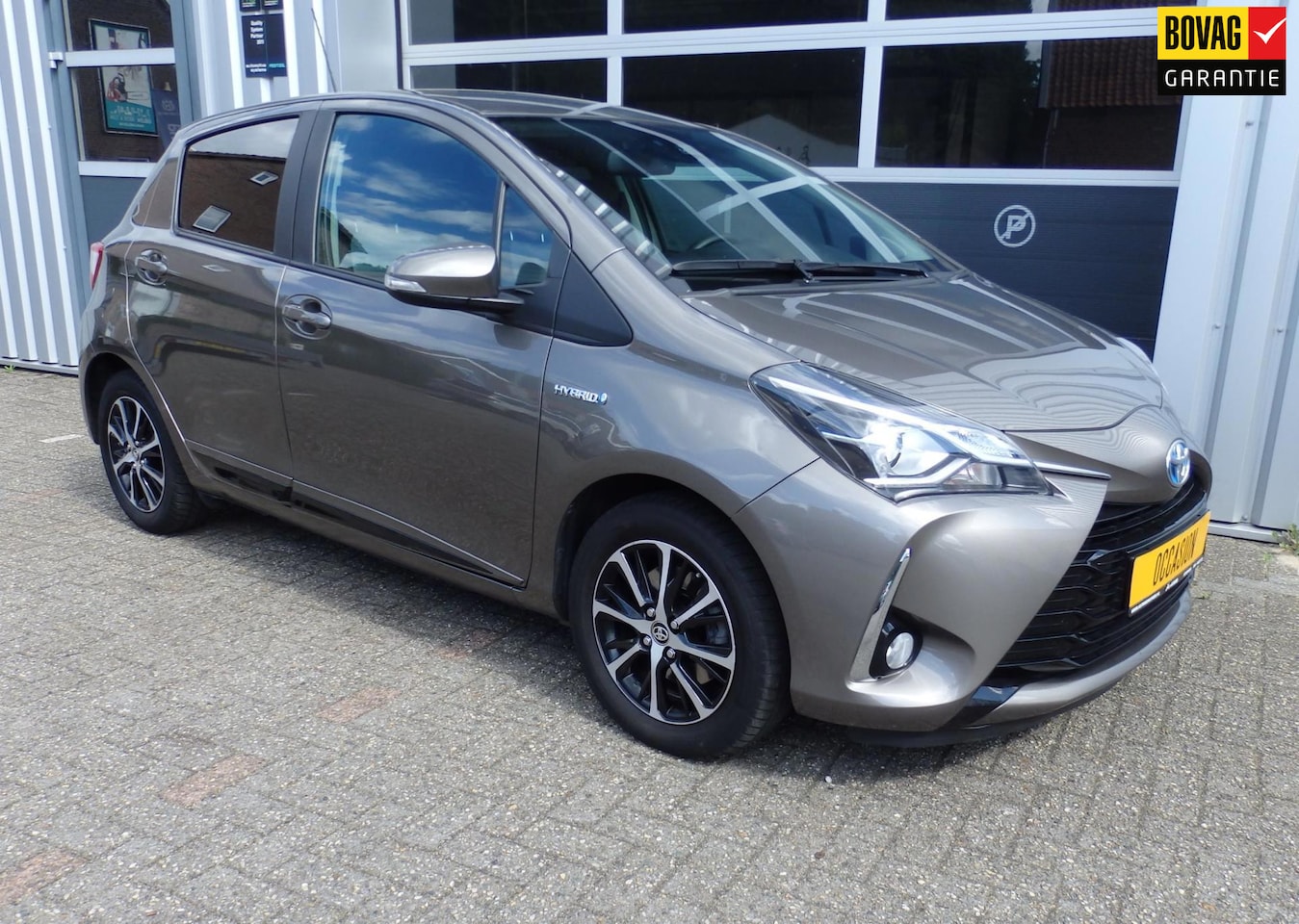 Toyota Yaris - 1.5 Hybrid Comfort | Navi | PDC | Fietsdrager trekhaak | - AutoWereld.nl