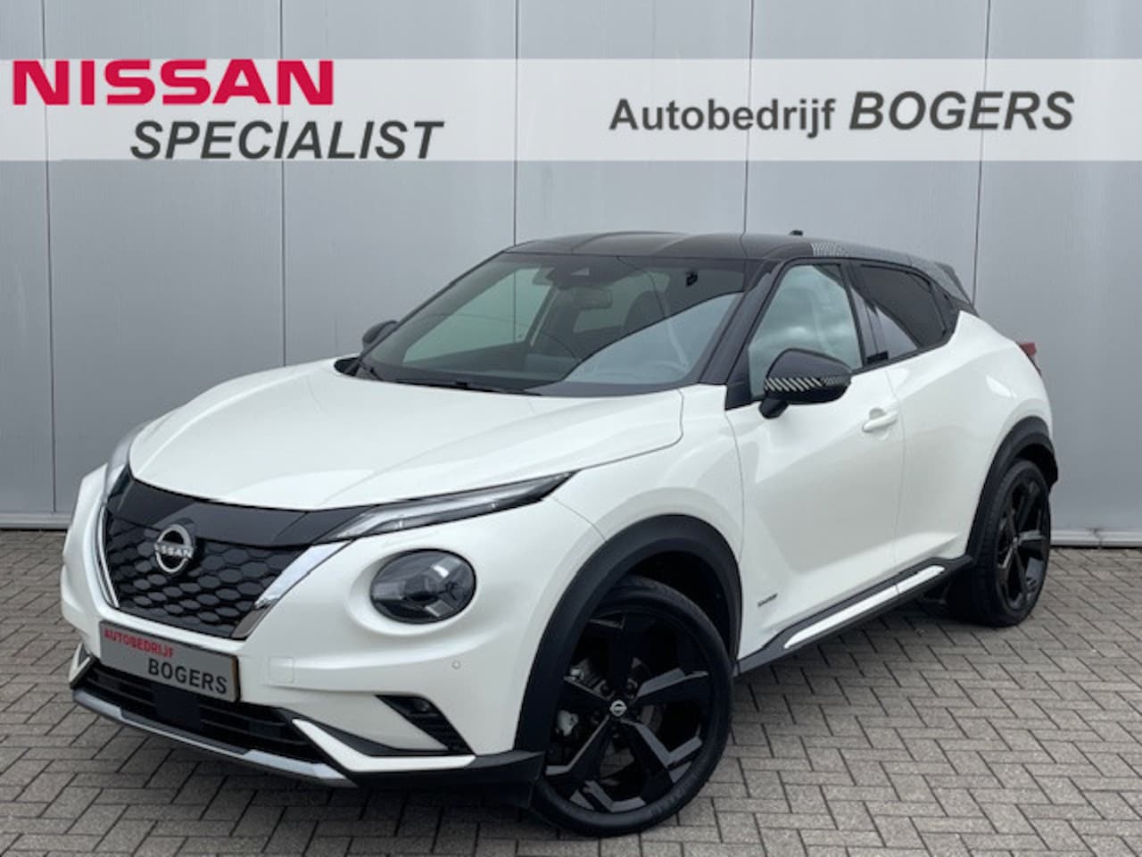 Nissan Juke - 1.6 Hybrid Premiere Edition Automaat Navigatie, Climate Control, Leder, 19"lm, Achteruitri - AutoWereld.nl